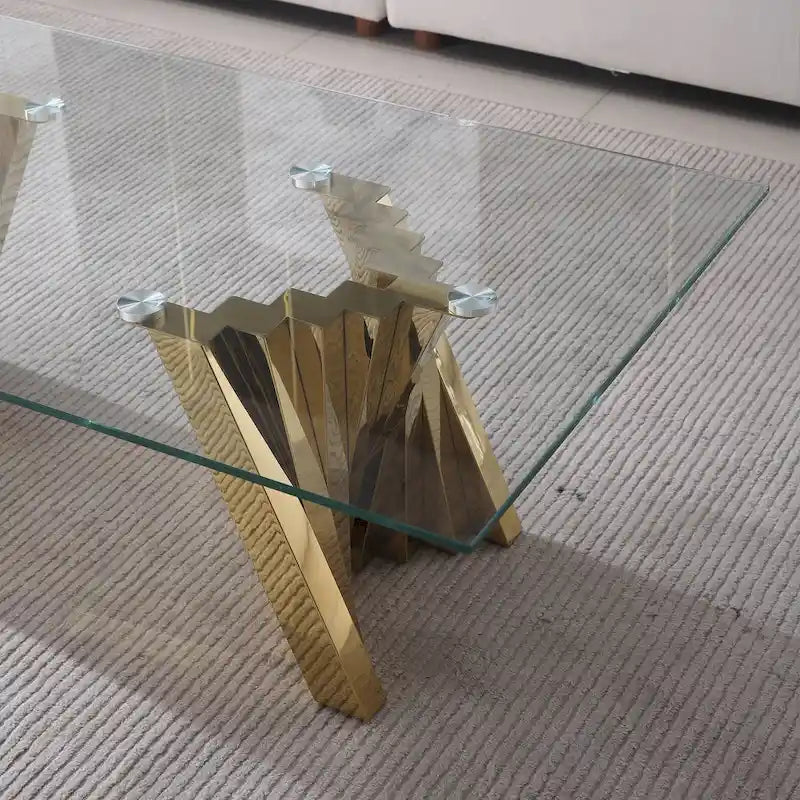 Couchtisch mit Tischplatte aus gehärtetem Glas und Edelstahlgestell in Goldspiegeloptik