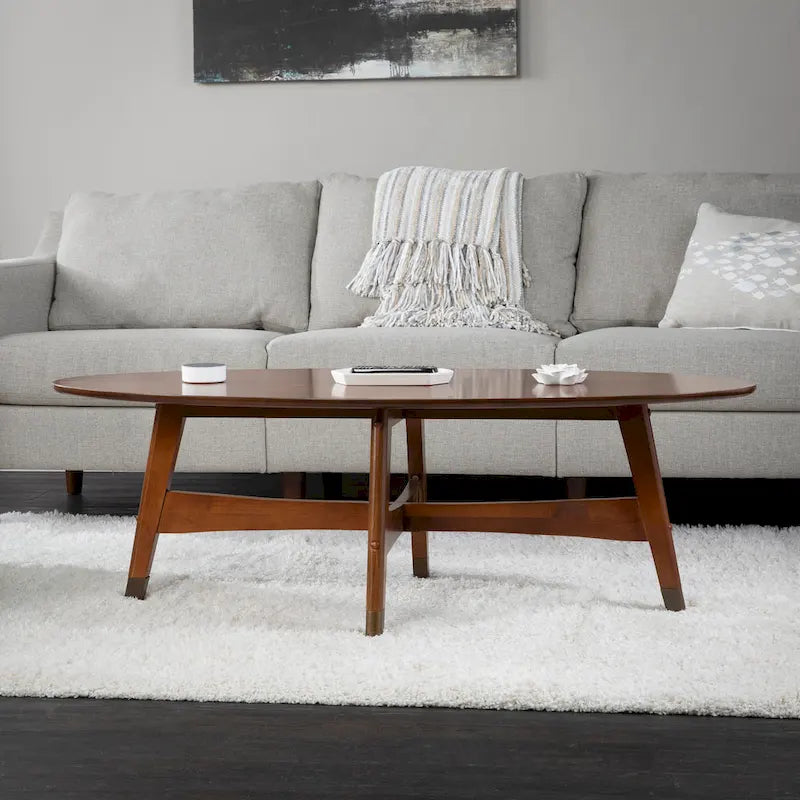 SEI Furniture Rhoda ovaler Couchtisch im Mid-Century-Modern-Stil aus Holz