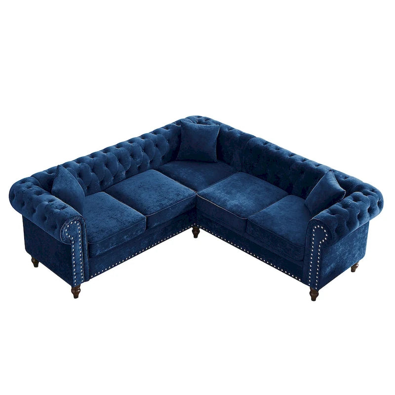 L-förmiges Sofa mit tief gehefteten Details und geschwungenen Armlehnen.