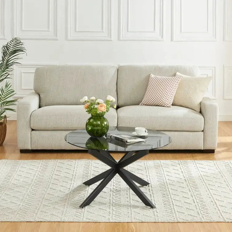 35.4 Runder Couchtisch mit Glasplatte