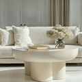 Cremefarbener runder Couchtisch