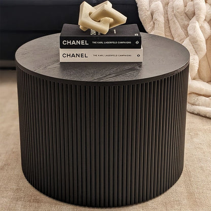 Runder Couchtisch aus schwarzem Holz